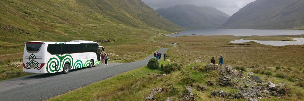 Private tour bus for ireland in the mountains