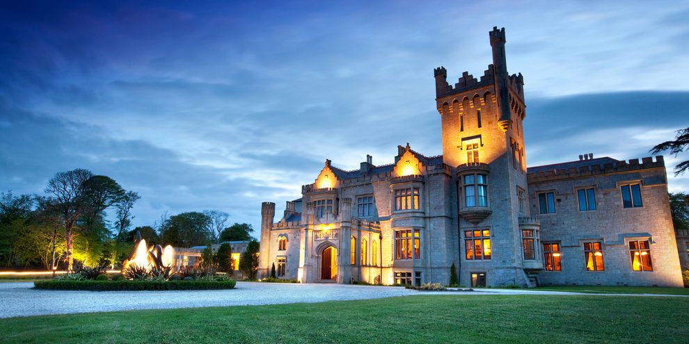 Lough Eske Castle lit up at dusk, County Donegal, Ireland