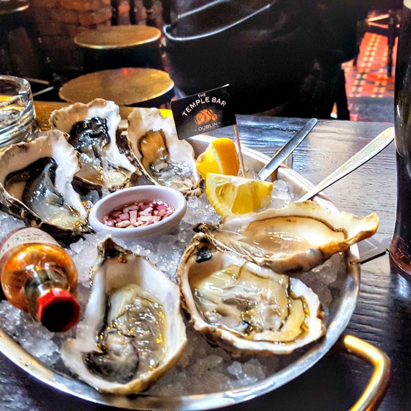 Oysters and Guinness, a must-try Irish Traditional Dish,