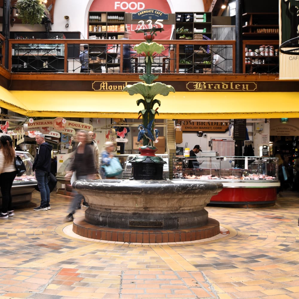 The historic covered market interior of the English Market in Cork City, Ireland