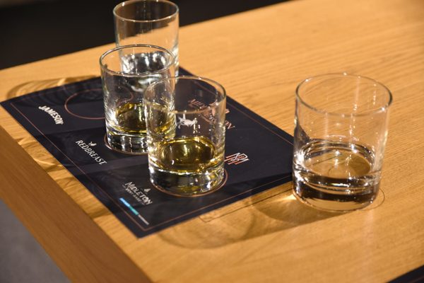 Three glasses of Irish whiskey on the bar at Midleton Distillery Experience