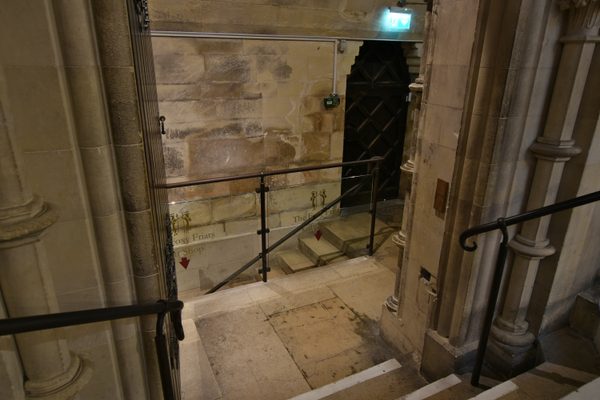 The bright, spacious stairwell and stone arches leading into the 12th-century crypt