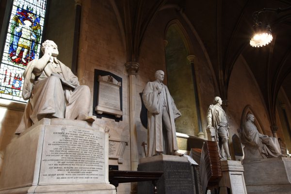 Stained glass and memorials along the north aisle