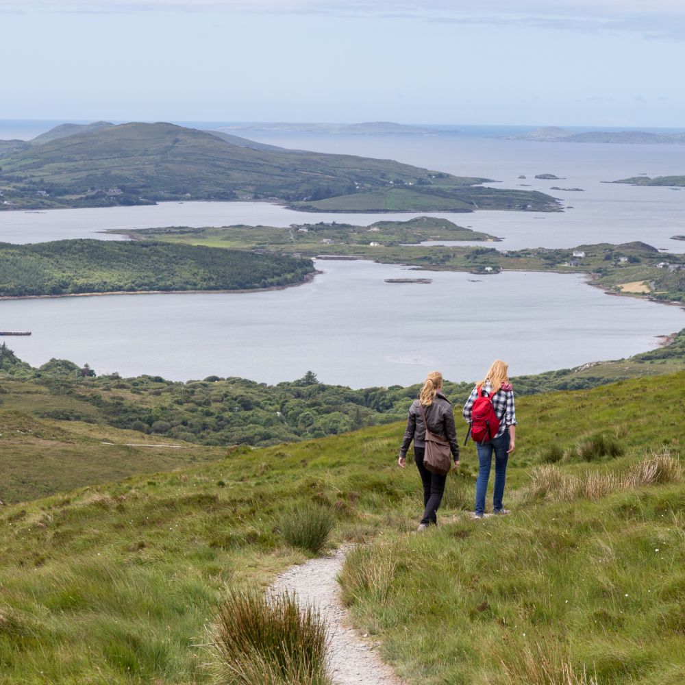 Girls backpacking through Connemara, Co. Galway, on the west coast of Ireland