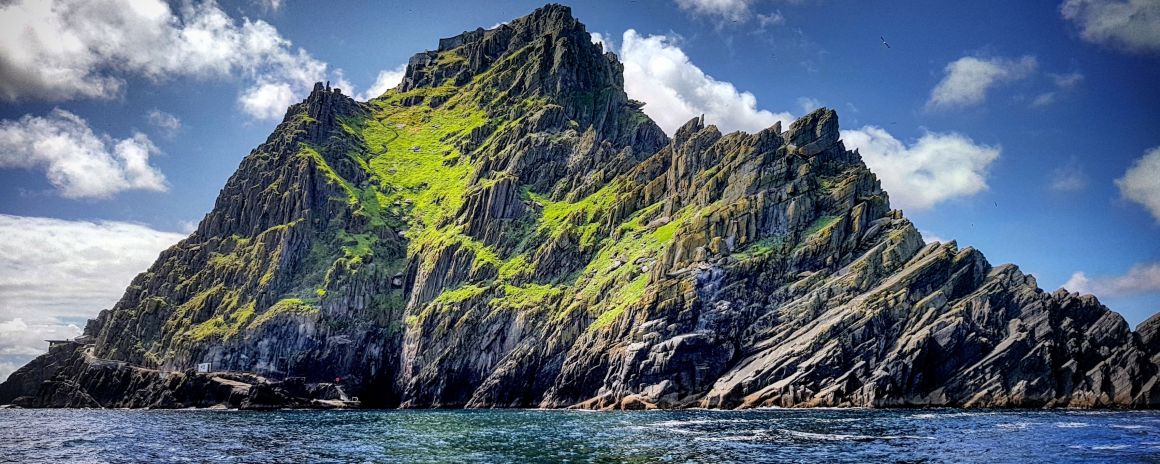 Skellig Michael Island off the Coast of Kerry on a blue sky day.