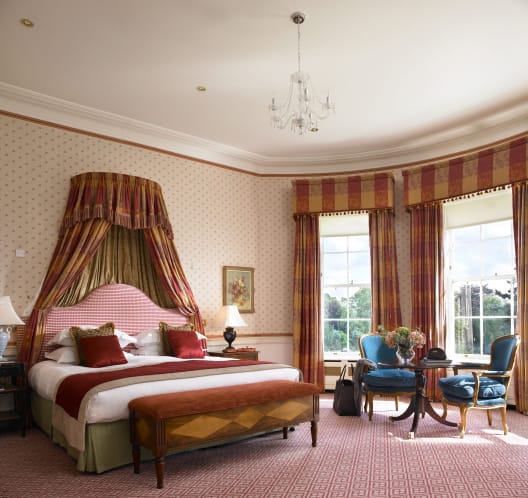 The Deluxe Room of the five-star K Club, where you will be staying during your time in County Kildare