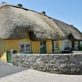 The famous thatched cottages lining the main street of Adare, County Limerick